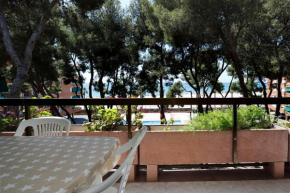 AT133 Els Pins, 1ra línea de la playa, piscina, airco, aparcamiento